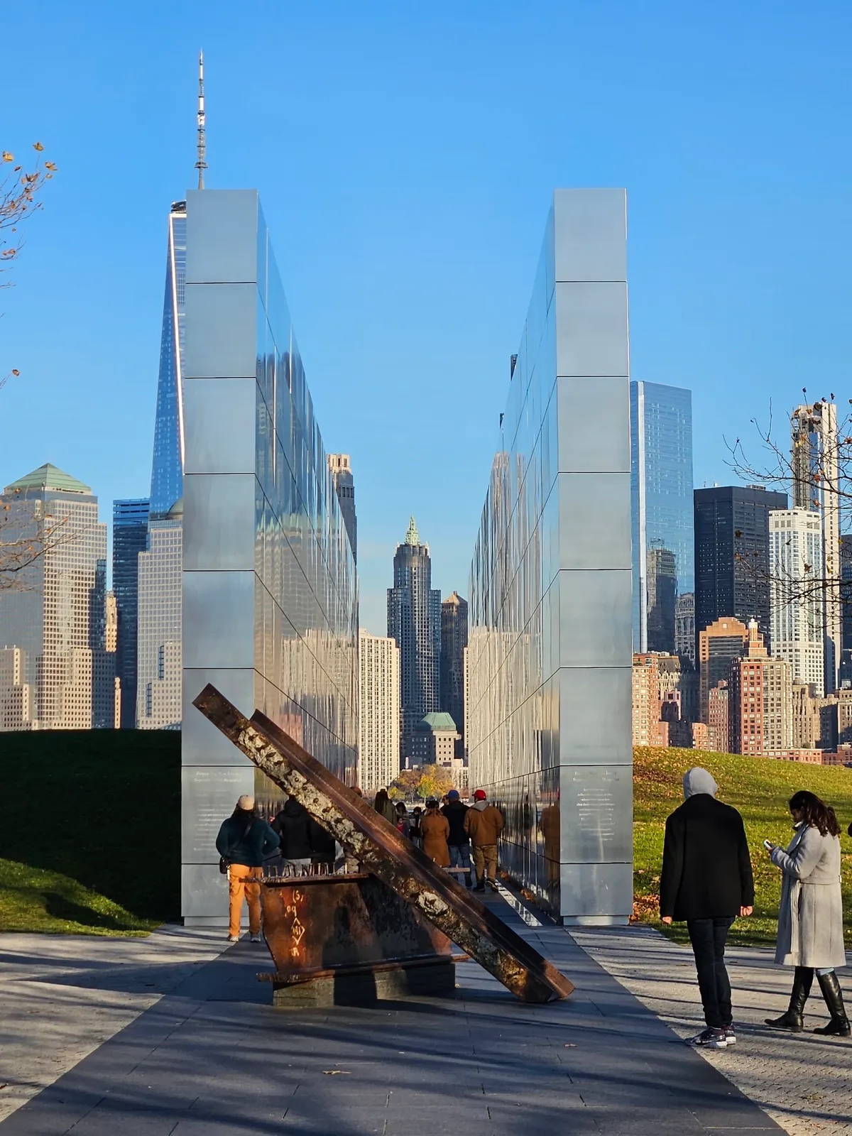 Empty Sky 9/11 Memorial facing Manhattan skyline