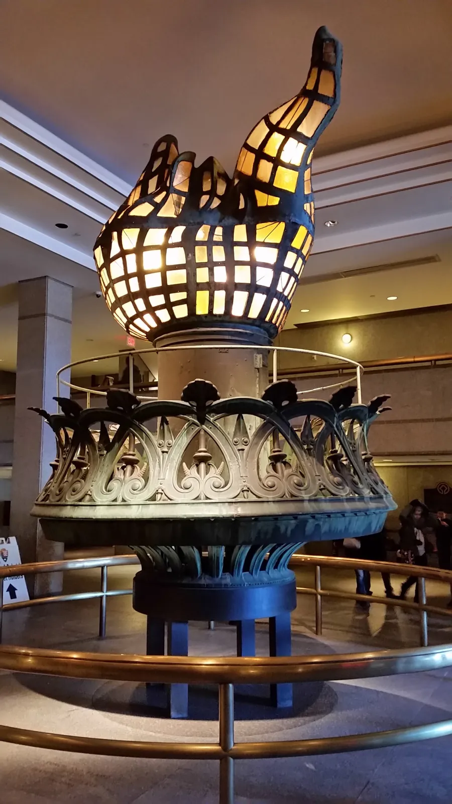 Illuminated original Statue of Liberty torch exhibit