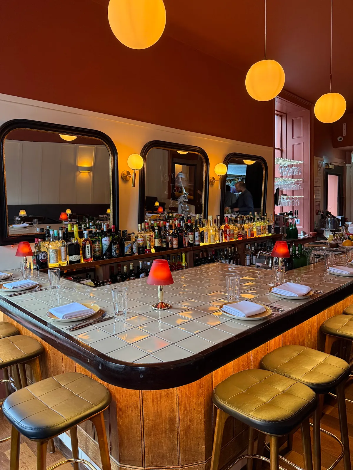 Stylish bar interior with warm globe lighting