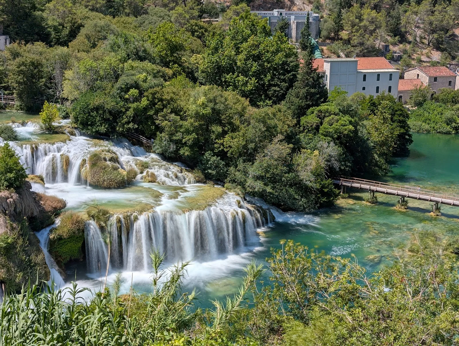 Skradinski Buk waterfalls cascading through lush greenery