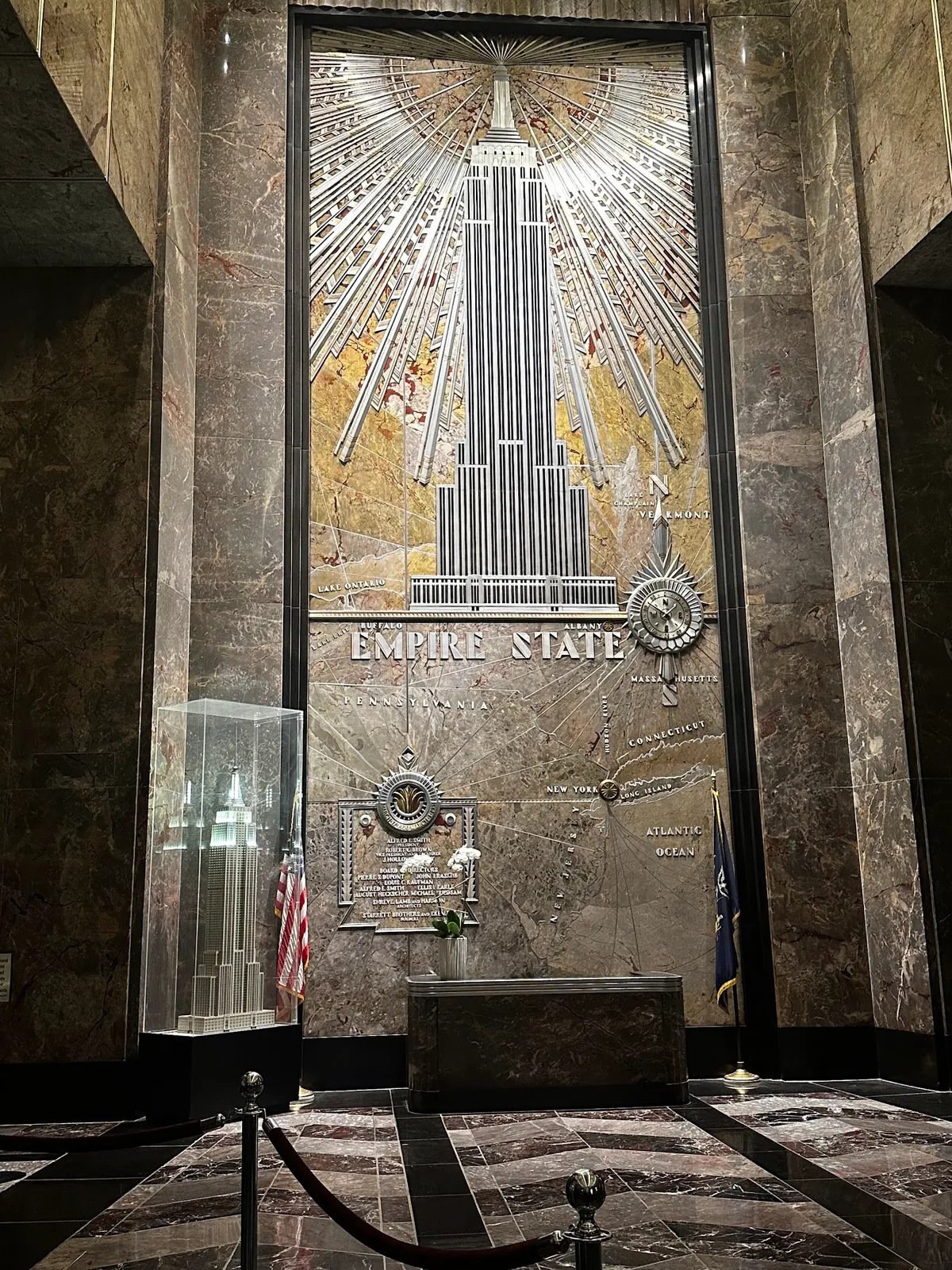 Grand Art Deco lobby mural, historic building details.