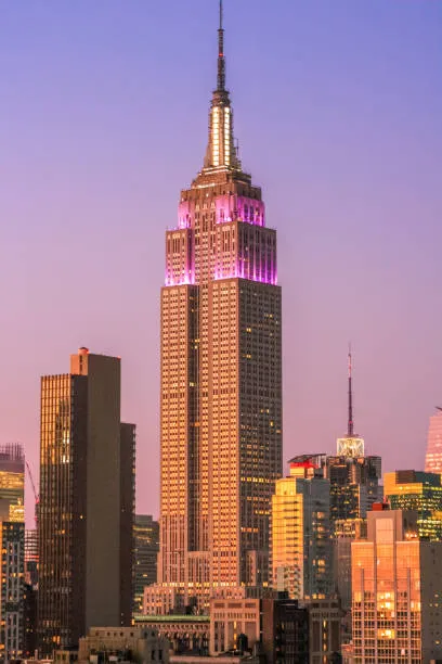 Purple and gold lights adorn historic landmark
